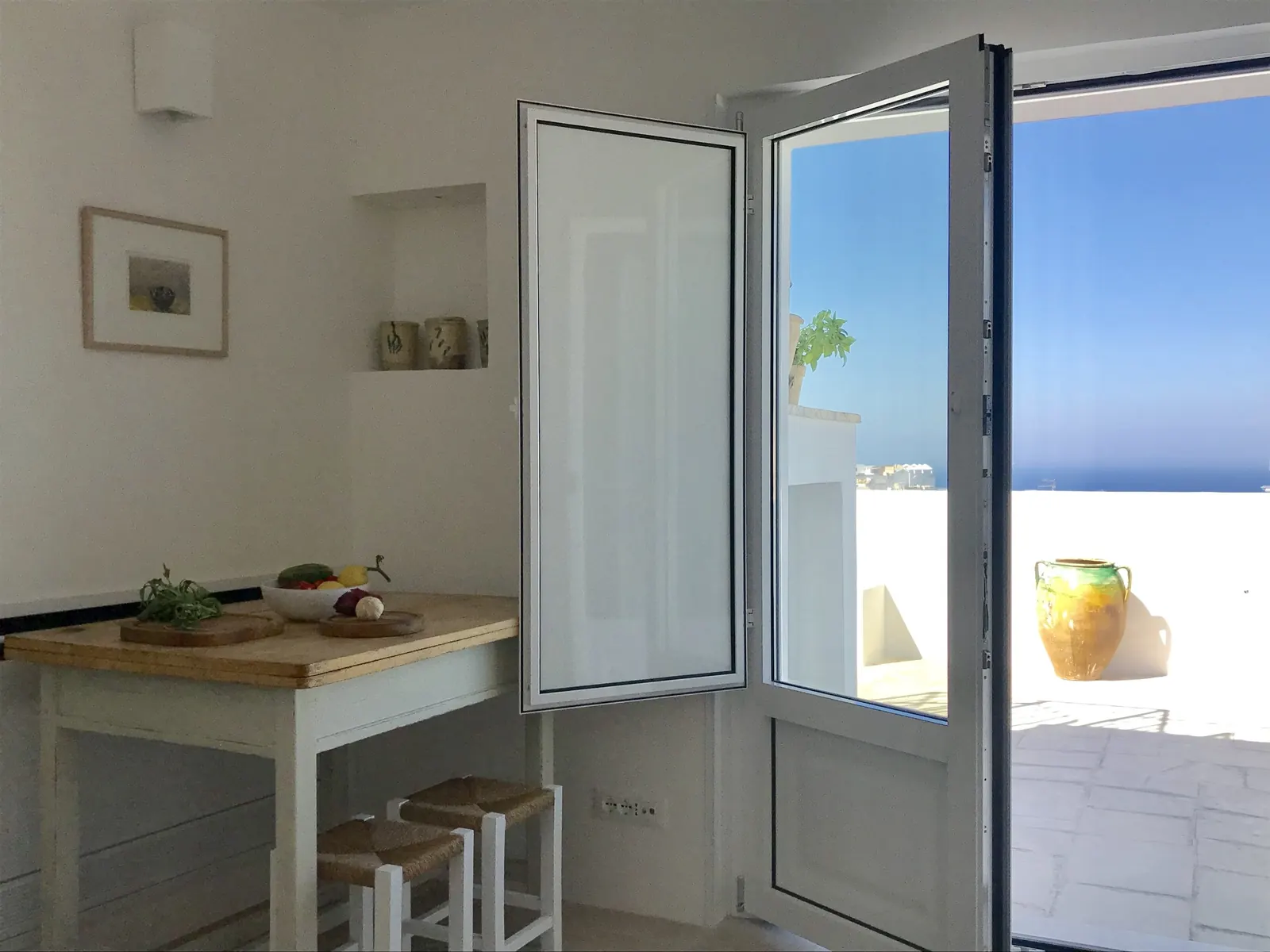 Breakfast table by the terrace door