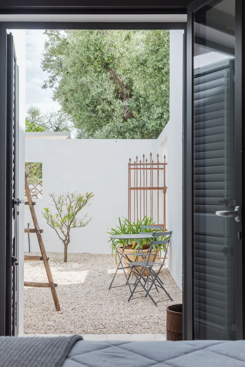 Doorway onto a walled courtyard garden