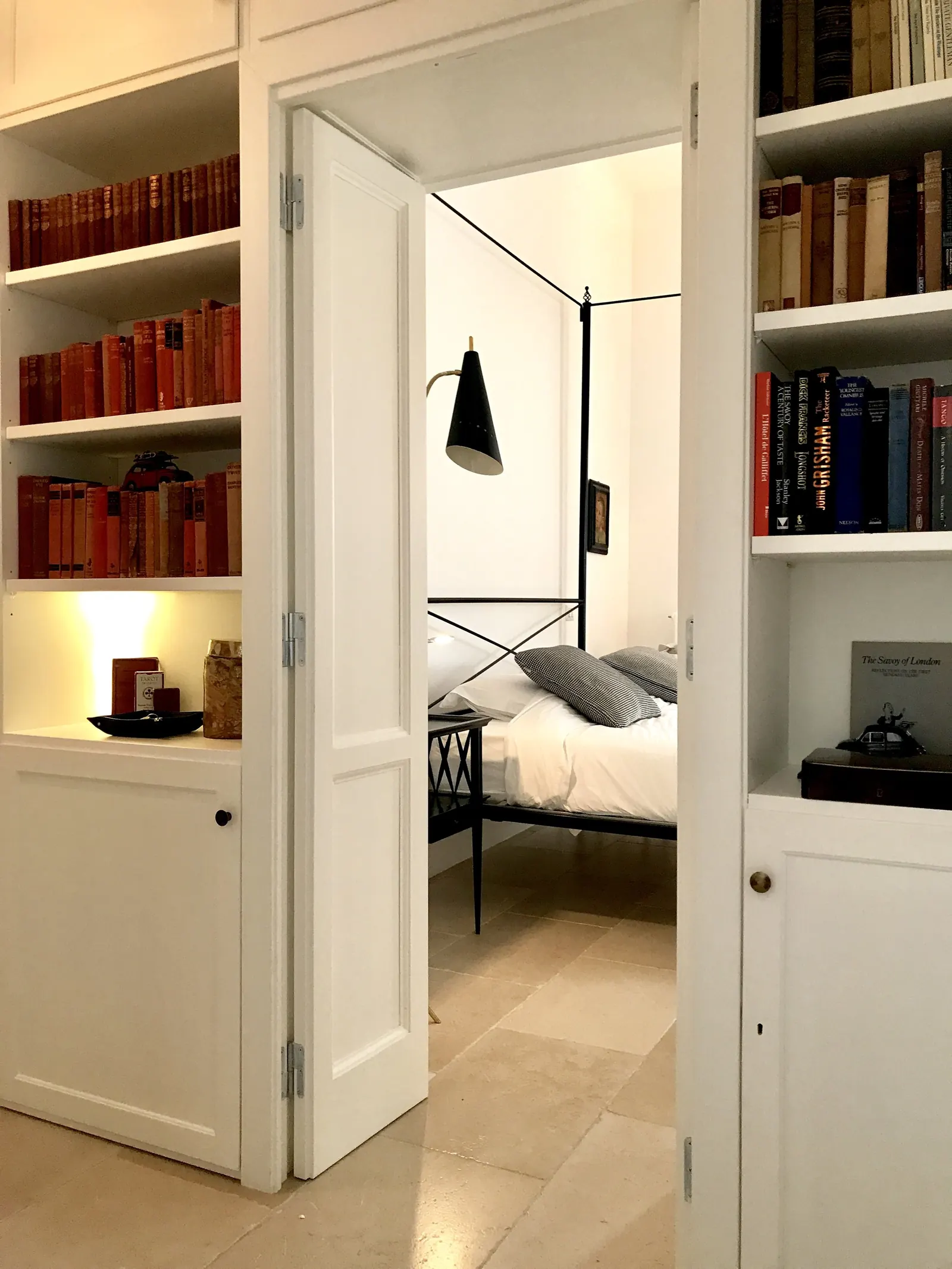 Bookshelves around the bedroom doorway