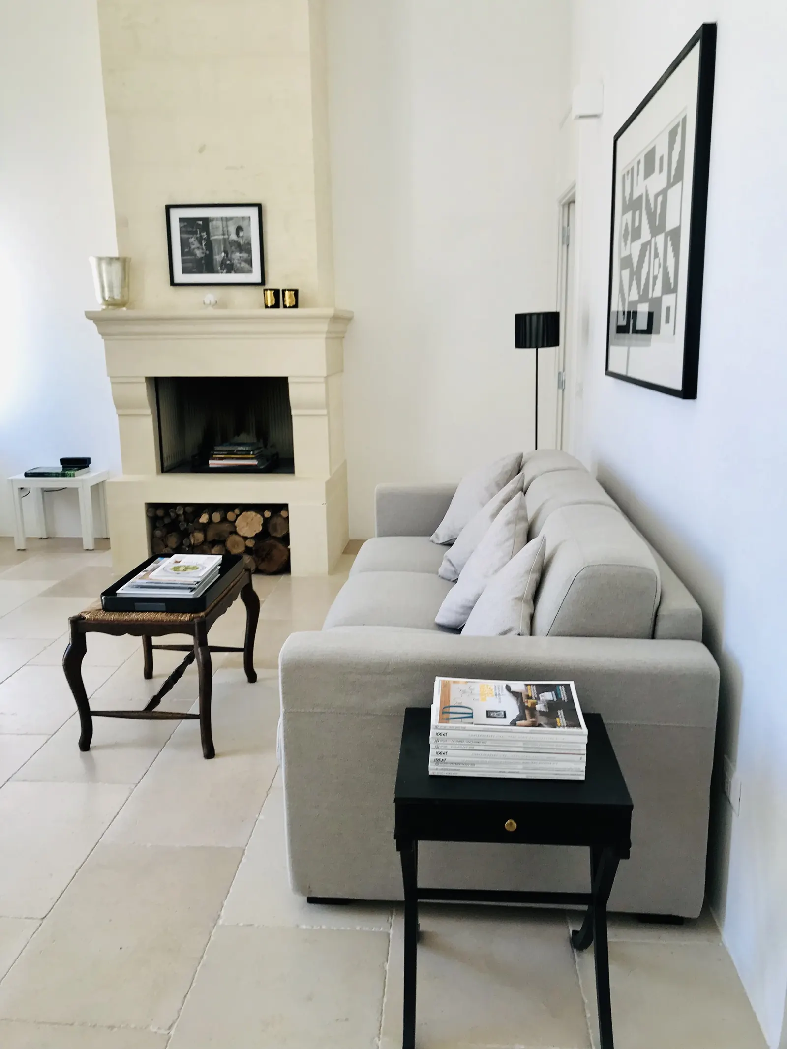 Sitting room with fireplace and sofa