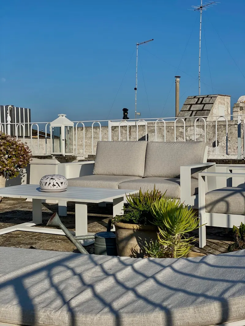 Rooftop sofa with a view of the town