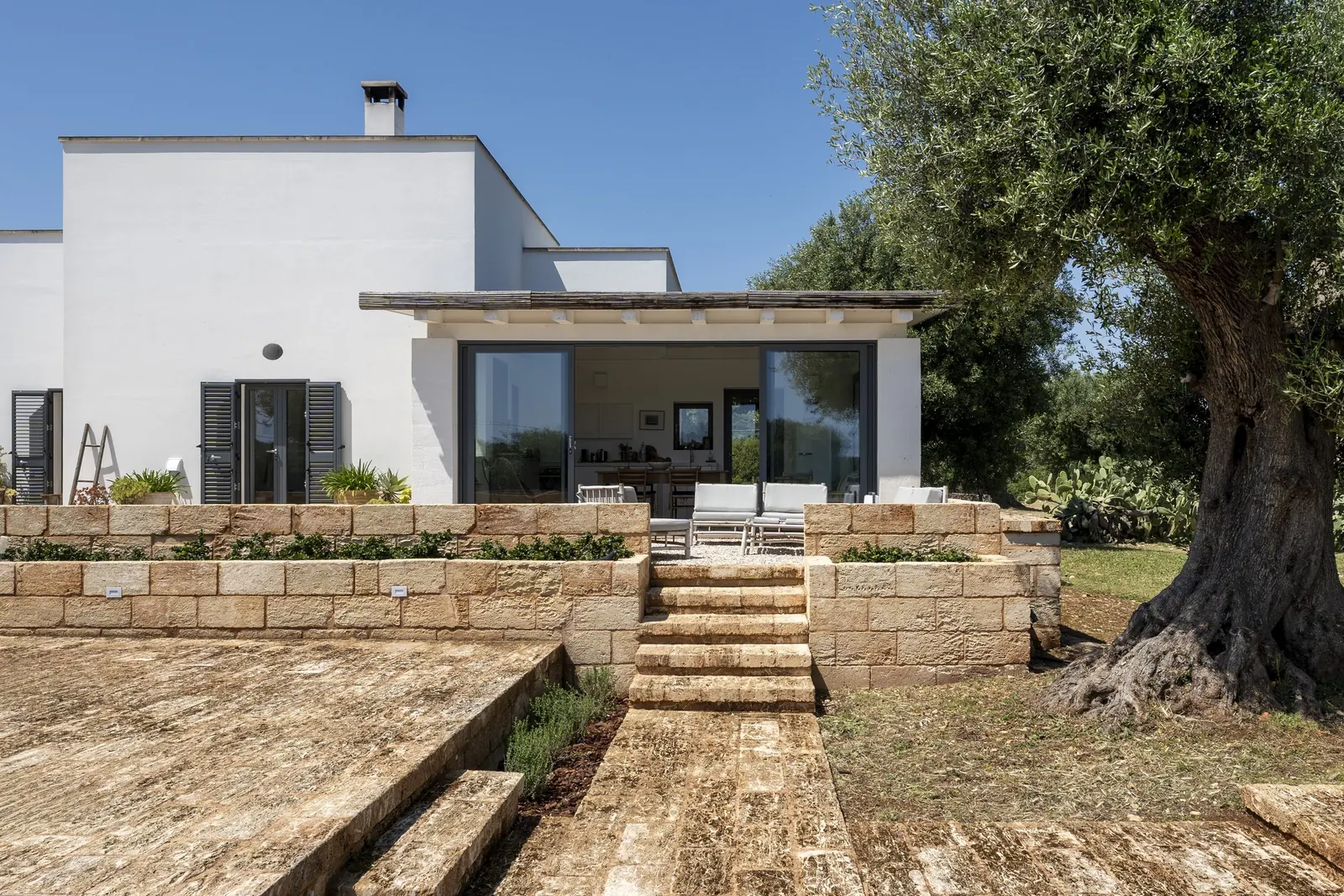 Villa facade and terrace steps