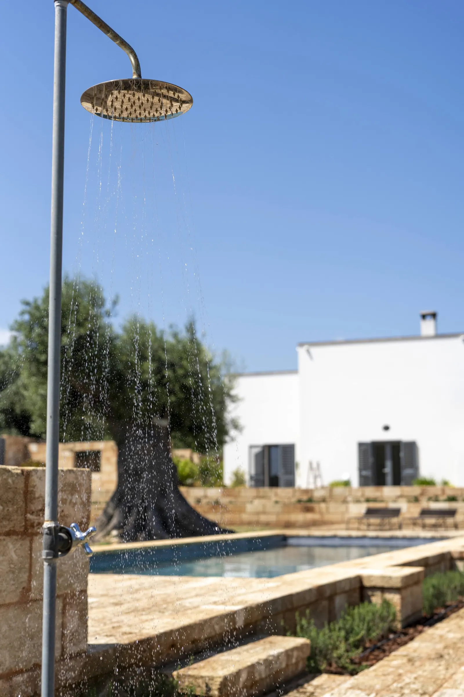Outdoor shower beside the pool